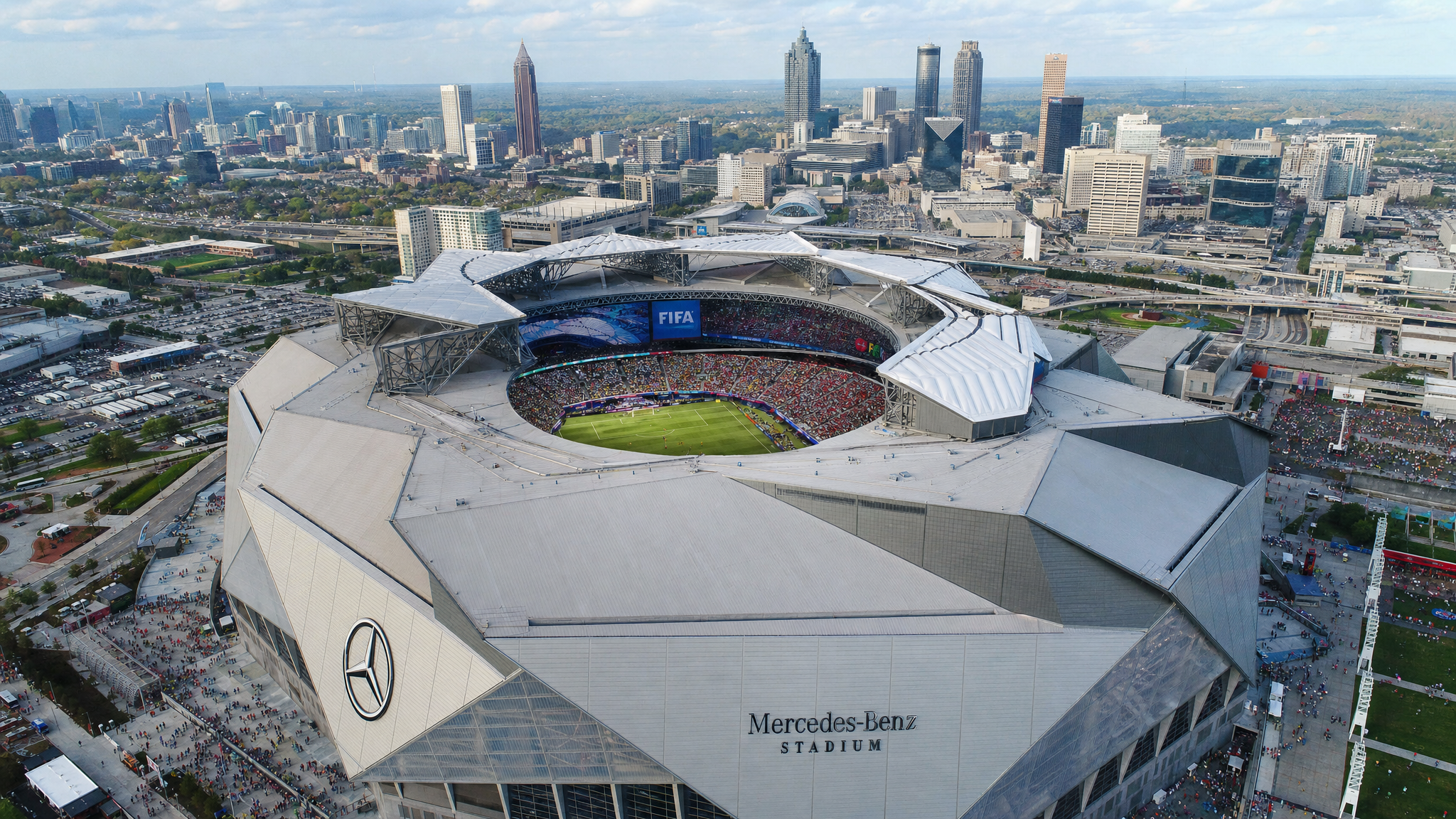 Mercedes-Benz Stadium in Atlanta packed for a FIFA World Cup 2026 match with Atlanta skyline visible.